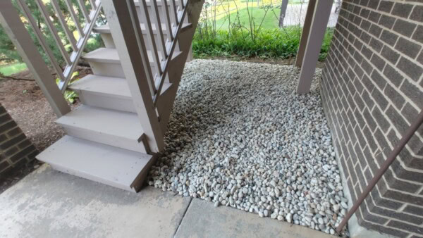 brown under deck gravel after